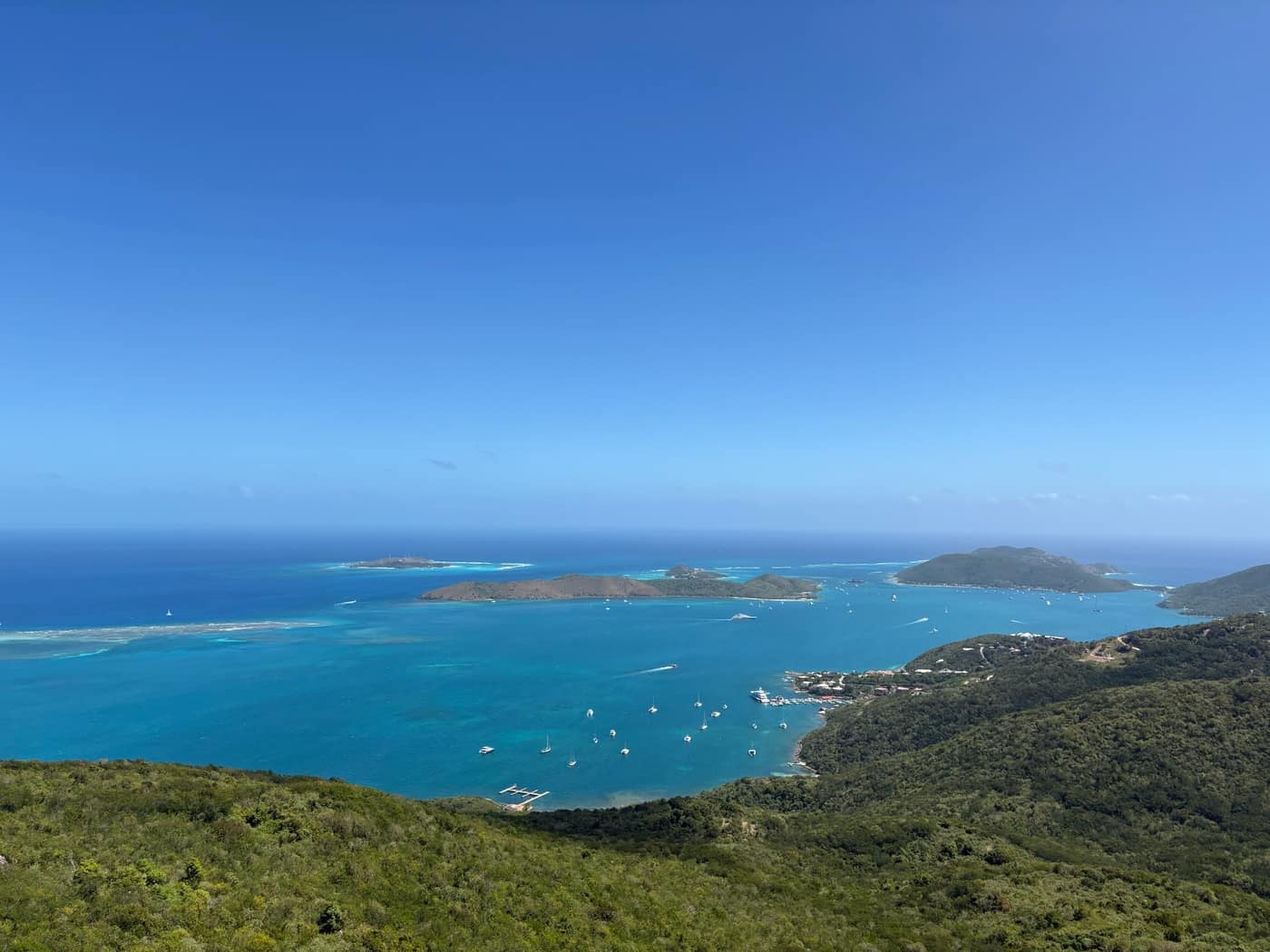 View from Hog Heaven's ridge above North Sound, Virgin Gorda, looking out over the reef, mooring field, and islands beyond.