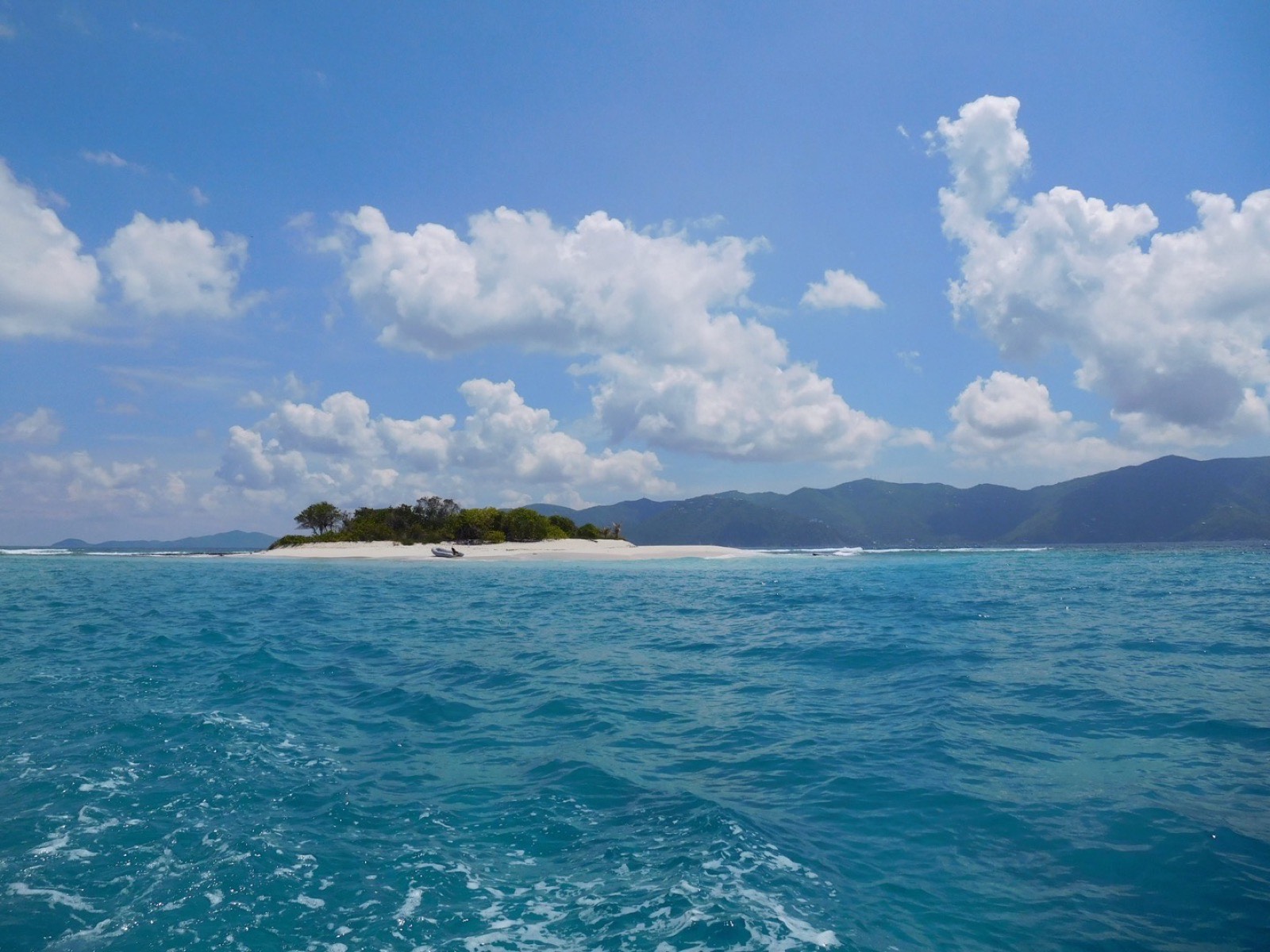 Sandy Spit, a small palm-topped sandbar off Jost Van Dyke, seen from the water before Hurricane Irma.