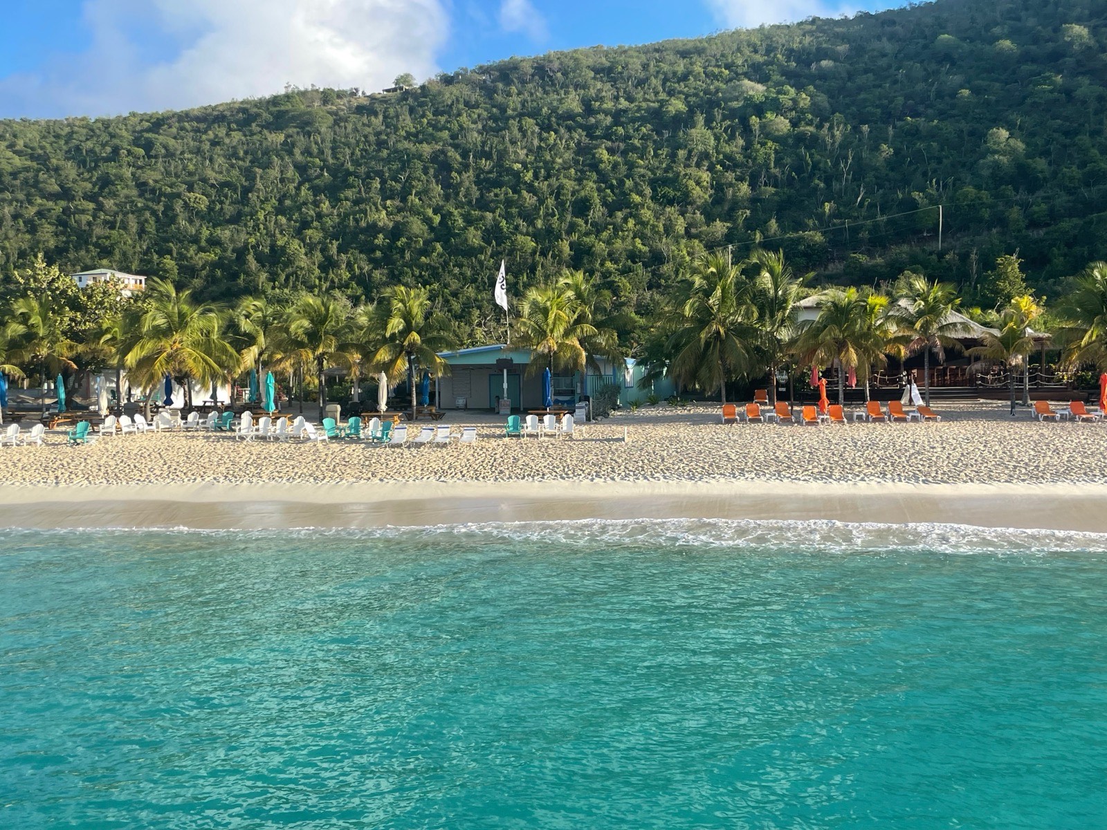 White Bay, Jost Van Dyke, seen from the water, with the Soggy Dollar and Hendo's Hideout along the beach.